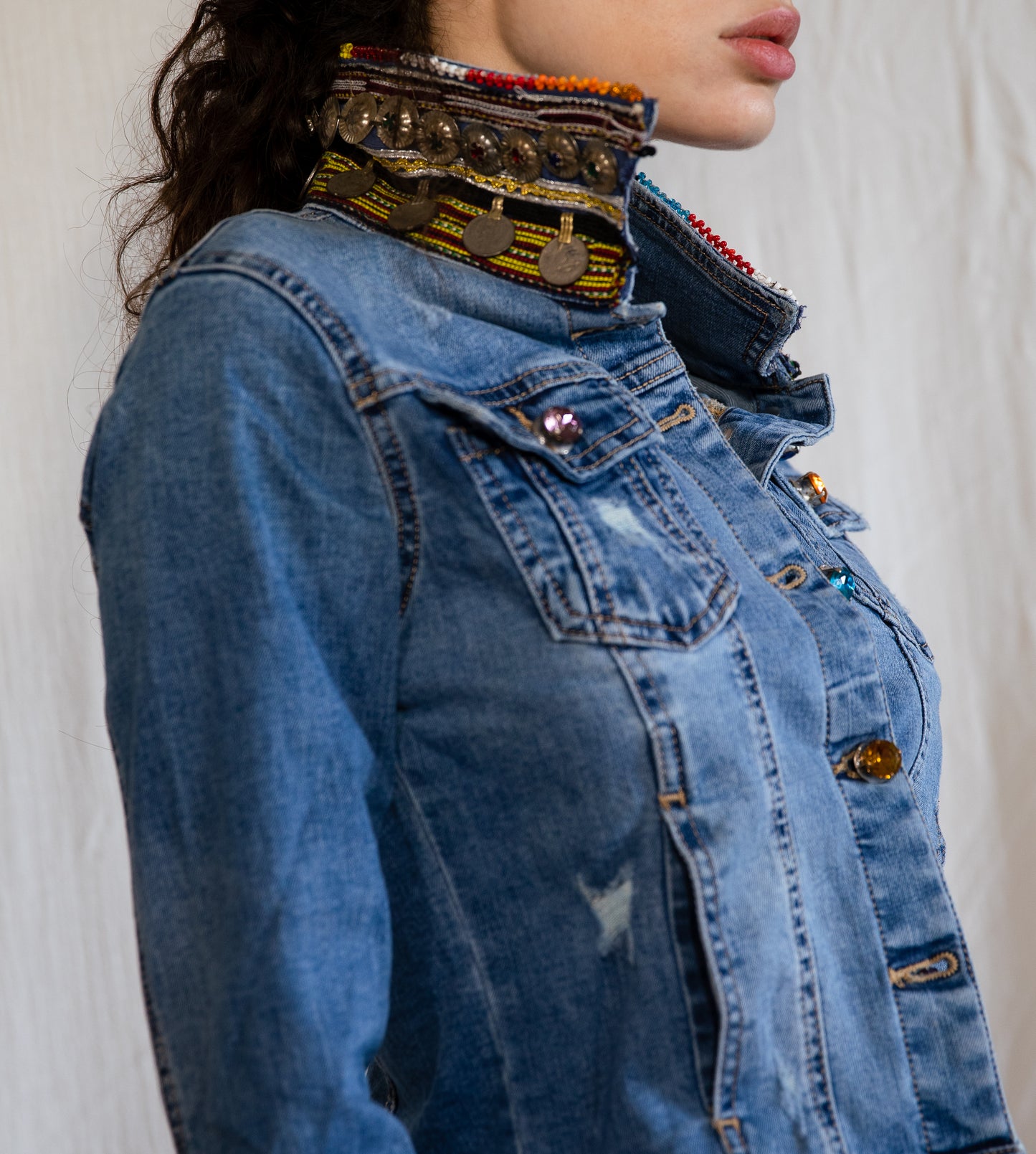 Classic denim jacket with unique handmade coin embroidery band