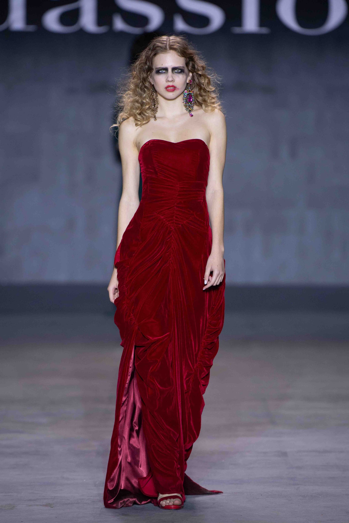 Cherry-red strapless velvet evening gown