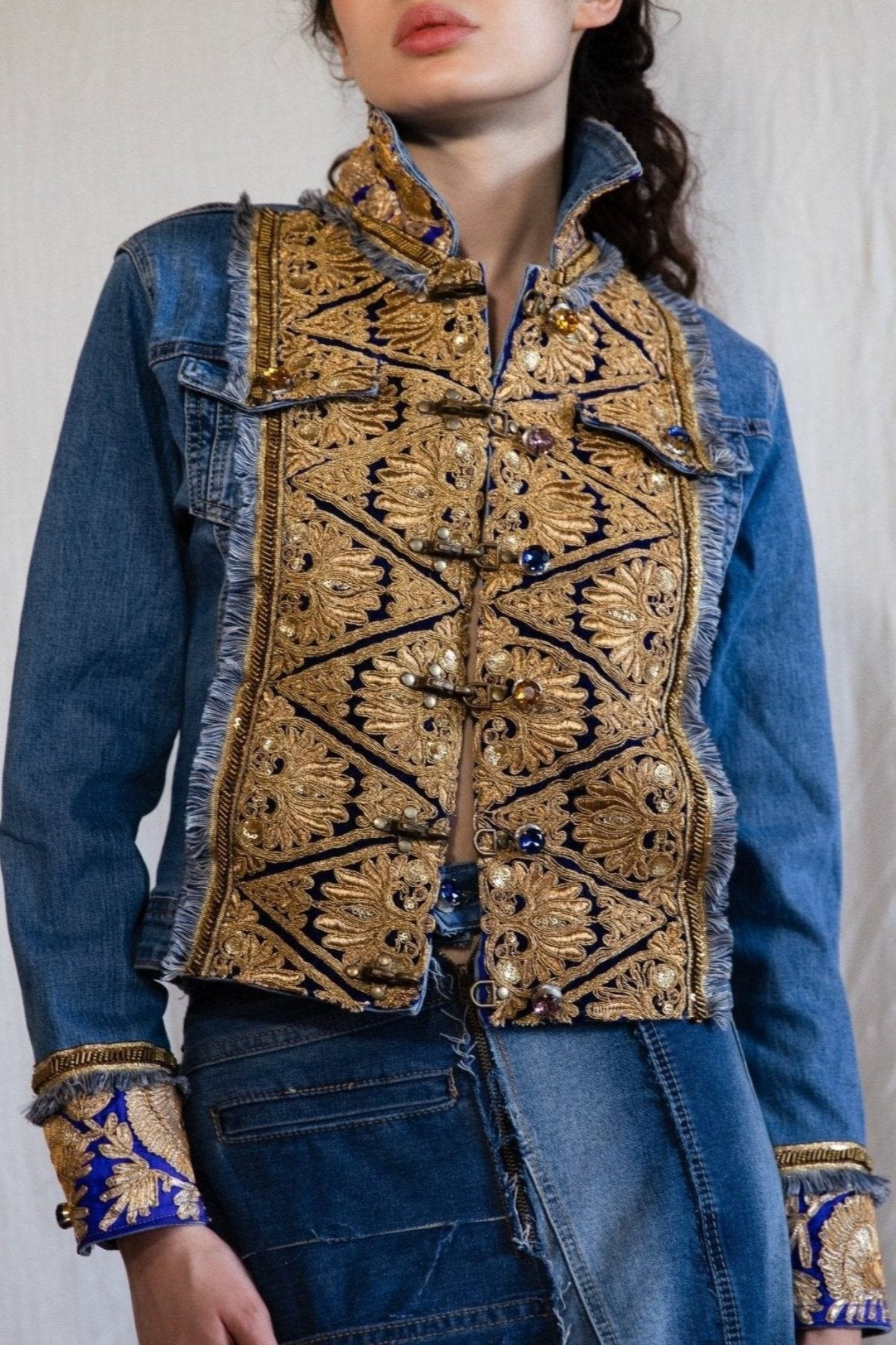 Denim jacket with blue and golden embroideries