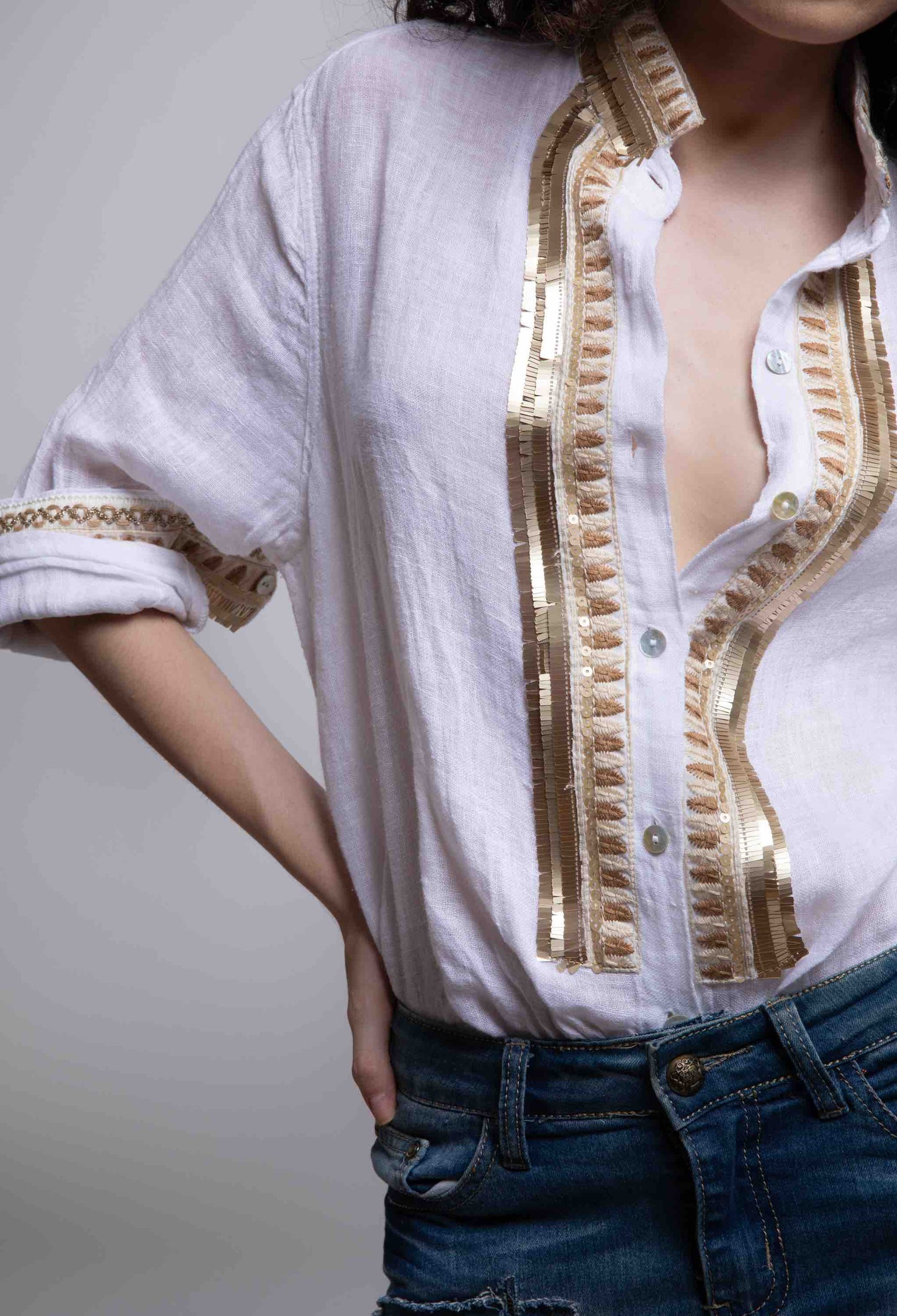 White linen shirt with golden embroidery
