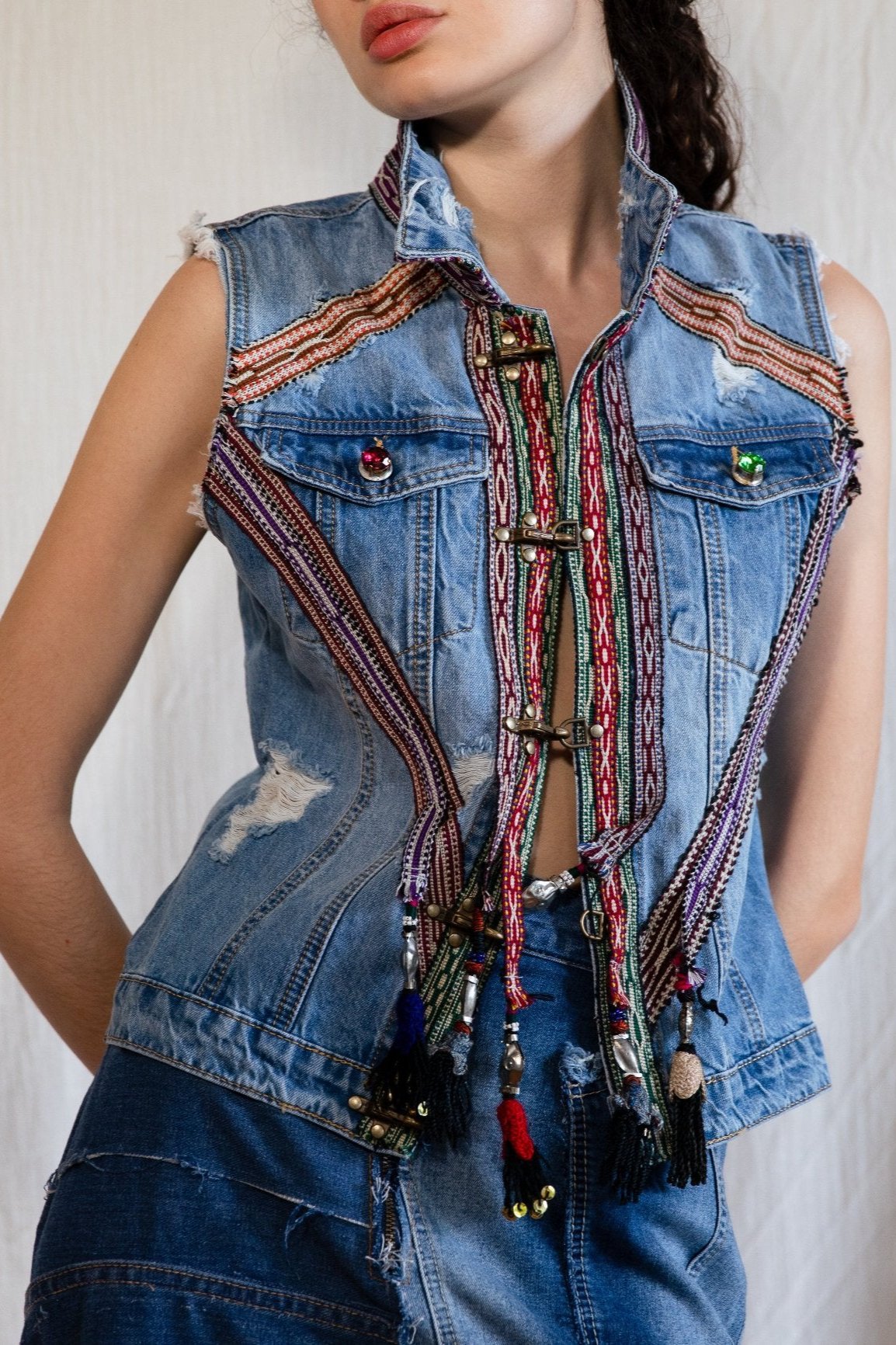 B.07 Denim vest with colorful trims and tassels