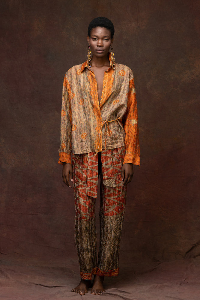 Model wearing a patterned outfit