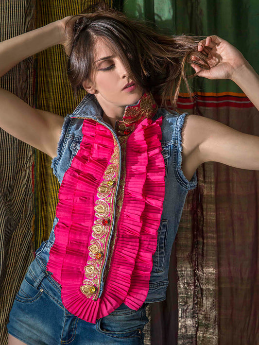 S.30 Denim vest with embroideries and cotton ruffles.